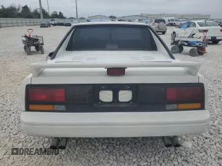 1989 Toyota MR2 z VIN JT2AW15C9K0154276, wystawiony jako Copart lot #78778464 z przebiegiem 234 520 mil mil oraz Szkody całkowita. Historia ofert i sprzedaży dostępna na DreamBid. Obrazek 6.