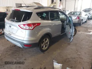 2013 Ford Escape SE z VIN 1FMCU9GX8DUD56926, wystawiony jako IAAI lot #41871248 z przebiegiem 36 807 mil mil oraz . Historia ofert i sprzedaży dostępna na DreamBid. Obrazek 4.