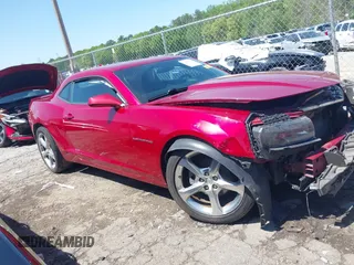 2014 Chevrolet Camaro LT z VIN 2G1FC1E38E9242518, wystawiony jako IAAI lot #41988618 z przebiegiem 90 993 mil mil oraz . Historia ofert i sprzedaży dostępna na DreamBid. Obrazek 14.