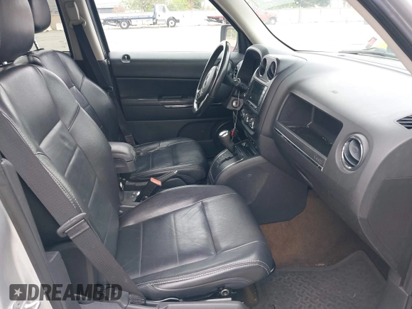 2014 Jeep Patriot Limited with VIN 1C4NJRCB0ED504715, listed as a IAAI auction lot 42080254 with 198,380 mi miles. Bid and sale history available at carsss.com. Image 5.