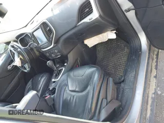 2016 Jeep Cherokee Trailhawk z VIN 1C4PJMBB6GW335837, wystawiony jako IAAI lot #41547478 z przebiegiem 236 483 mil mil oraz . Historia ofert i sprzedaży dostępna na DreamBid. Obrazek 5.