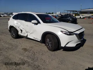 2020 Mazda CX-9 Touring with VIN JM3TCBCY8L0417315, listed as a Copart auction lot 58526135 with 56,250 mi miles and Salvage title. Bid and sale history available at DreamBid. Image 4.