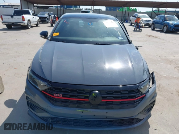 2020 Volkswagen Jetta GLI S z VIN 3VW6T7BU0LM047800, wystawiony jako IAAI lot #42263748 z przebiegiem 58 903 mil mil oraz . Historia ofert i sprzedaży dostępna na DreamBid. Obrazek 12.