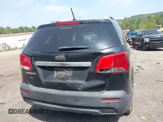 2011 Kia Sorento LX with VIN 5XYKTDA28BG157022, listed as a IAAI auction lot 42061926 with 211,826 mi miles. Bid and sale history available at carsss.com. Image 12.