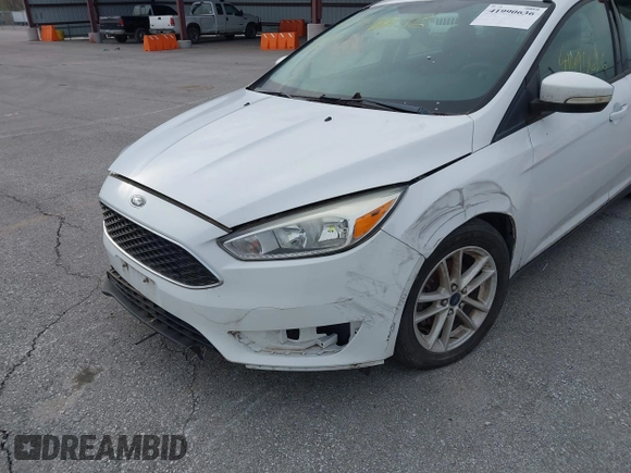 2015 Ford Focus SE with VIN 1FADP3F23FL255584, listed as a IAAI auction lot 41990636 with 151,389 mi miles. Bid and sale history available at carsss.com. Image 6.