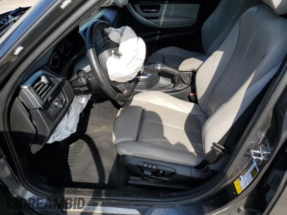 2012 BMW 3 Series 335i with VIN WBA3A9C5XCF474803, listed as a Copart auction lot 57940675 with 121,960 mi miles and Salvage title. Bid and sale history available at DreamBid. Image 7.
