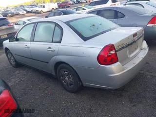 2005 Chevrolet Malibu with VIN 1G1ZS52F55F212387, listed as a IAAI auction lot 41994212 with 227,576 mi miles. Bid and sale history available at carsss.com. Image 3.