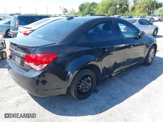 2015 Chevrolet Cruze LS with VIN 1G1PA5SH4F7145689, listed as a IAAI auction lot 41791381 with 100,443 mi miles. Bid and sale history available at carsss.com. Image 4.