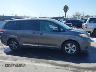 2012 Toyota Sienna LE AAS with VIN 5TDKK3DC9CS184722, listed as a IAAI auction lot 41942991 with 227,783 mi miles. Bid and sale history available at carsss.com. Image 13.