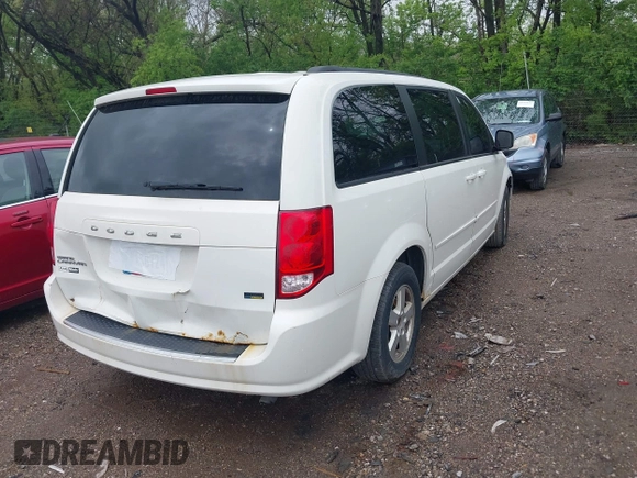2012 Dodge Grand Caravan SXT with VIN 2C4RDGCG4CR145484, listed as a IAAI auction lot 42127663 with 278,872 mi miles and . Bid and sale history available at DreamBid. Image 4.