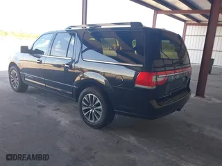 2015 Lincoln Navigator L with VIN 5LMJJ3JT0FEJ12569, listed as a IAAI auction lot 41909517 with 165,631 mi miles. Bid and sale history available at carsss.com. Image 3.
