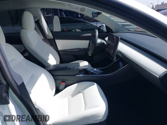 2021 Tesla Model Y Long Range with VIN 5YJYGDEE3MF081304, listed as a IAAI auction lot 41706240 with 90,510 mi miles and . Bid and sale history available at DreamBid. Image 5.