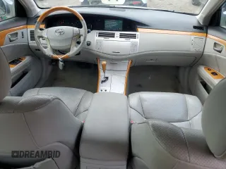 2007 Toyota Avalon XL z VIN 4T1BK36B47U186914, wystawiony jako Copart lot #60364125 z przebiegiem 239 293 mil mil oraz Czysty tytuł • Clean title. Historia ofert i sprzedaży dostępna na DreamBid. Obrazek 8.