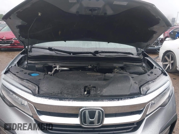 2019 Honda Pilot Touring 8-Passenger with VIN 5FNYF6H98KB097105, listed as a IAAI auction lot 42353009 with 133,212 mi miles and . Bid and sale history available at DreamBid. Image 10.