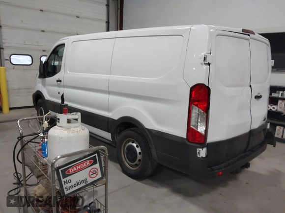 2024 Ford Transit Cargo with VIN 1FTYE1Y89RKA72434, listed as a IAAI auction lot 40788108 with 9,647 mi miles. Bid and sale history available at carsss.com. Image 3.