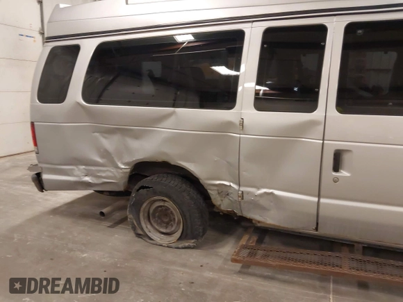 2014 Ford Econoline Wagon XL with VIN 1FBSS3BL1EDA11623, listed as a IAAI auction lot 41812934 with Not Provided miles. Bid and sale history available at carsss.com. Image 6.