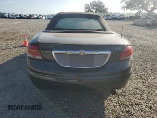 2004 Chrysler Sebring LXi z VIN 1C3EL55R74N121400, wystawiony jako Copart lot #80369614 z przebiegiem Nie podano mil oraz Nie do naprawy. Historia ofert i sprzedaży dostępna na DreamBid. Obrazek 6.