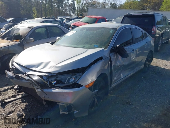 2019 Honda Civic Sport with VIN 19XFC2F88KE034868, listed as a IAAI auction lot 41913004 with 60,599 mi miles and . Bid and sale history available at DreamBid. Image 2.