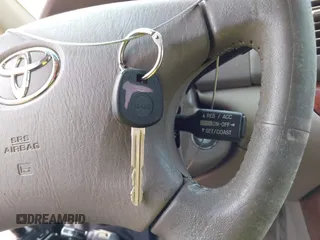 2003 Toyota Camry LE z VIN 4T1BE30KX3U197331, wystawiony jako IAAI lot #42298164 z przebiegiem 248 008 mil mil oraz . Historia ofert i sprzedaży dostępna na DreamBid. Obrazek 11.