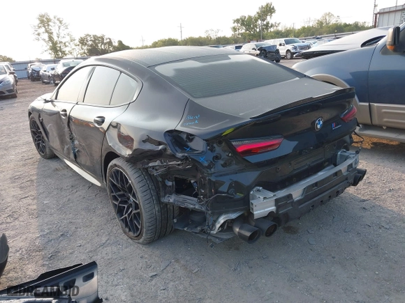 2020 BMW M8 with VIN WBSGV0C06LCD99264, listed as a IAAI auction lot 40276722 with 38,039 mi miles. Bid and sale history available at carsss.com. Image 3.