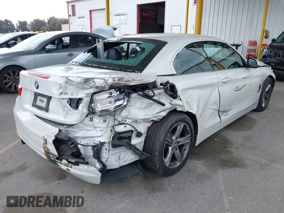 2015 BMW 4 Series 428i with VIN WBA3V7C5XFP772663, listed as a IAAI auction lot 42101012 with 75,901 mi miles and . Bid and sale history available at DreamBid. Image 4.