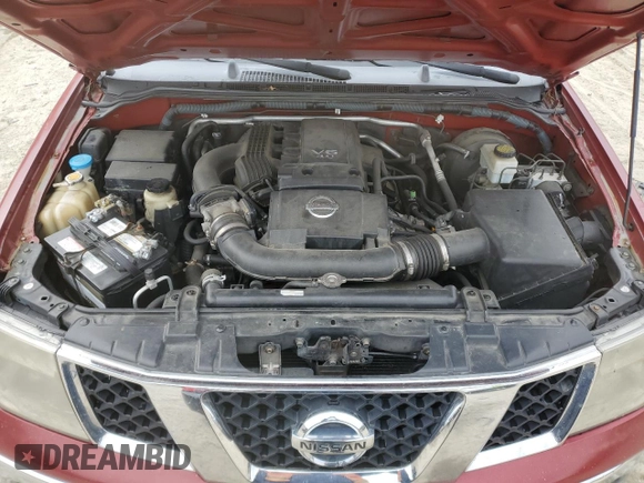 2006 Nissan Frontier SE with VIN 1N6AD06U76C466659, listed as a Copart auction lot 52045855 with 218,985 mi miles and Salvage title. Bid and sale history available at DreamBid. Image 11.