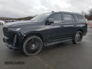 2021 Cadillac Escalade Premium Luxury z VIN 1GYS4BKL9MR437832, wystawiony jako Copart lot #72862564 z przebiegiem 54 082 mil mil oraz Tytuł czysty. Historia ofert i sprzedaży dostępna na DreamBid. Obrazek 1.