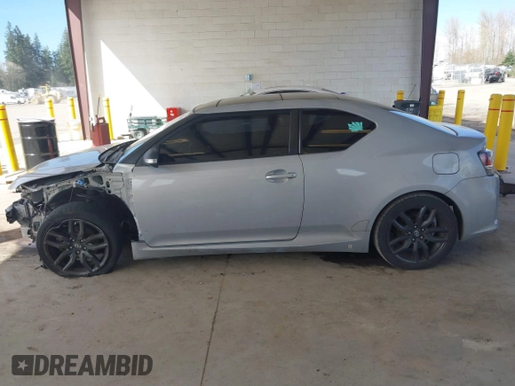2014 Scion tC with VIN JTKJF5C71E3069593, listed as a IAAI auction lot 41901040 with 86,231 mi miles. Bid and sale history available at carsss.com. Image 14.