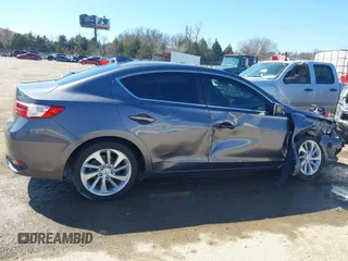 2018 Acura ILX z VIN 19UDE2F3XJA005686, wystawiony jako IAAI lot #41734118 z przebiegiem 39 977 mil mil oraz . Historia ofert i sprzedaży dostępna na DreamBid. Obrazek 13.
