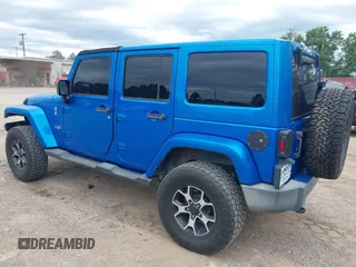 2016 Jeep Wrangler Unlimited 75th Anniversary with VIN 1C4HJWEG0GL154418, listed as a IAAI auction lot 42192717 with 102,514 mi miles and . Bid and sale history available at DreamBid. Image 3.