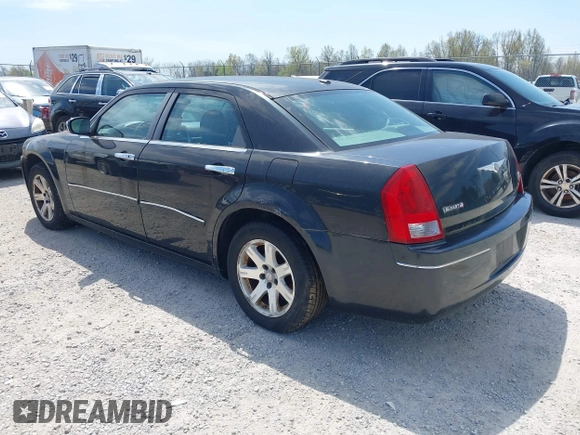 2006 Chrysler 300 Touring with VIN 2C3LA53G66H329729, listed as a IAAI auction lot 41946723 with 134,465 mi miles. Bid and sale history available at carsss.com. Image 3.