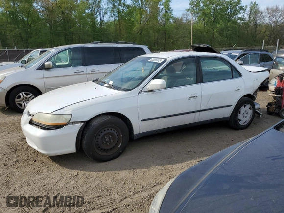 2000 Honda Accord LX z VIN 1HGCG1642YA080255, wystawiony jako Copart lot #53636855 z przebiegiem 146 478 mil mil oraz Szkoda całkowita • Salvage title. Historia ofert i sprzedaży dostępna na DreamBid. Obrazek 1.
