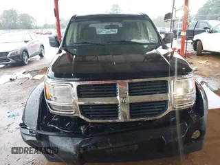 2007 Dodge Nitro SXT with VIN 1D8GT28K67W683600, listed as a IAAI auction lot 40958011 with 70,141 mi miles. Bid and sale history available at carsss.com. Image 12.