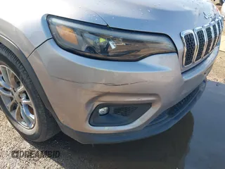 2019 Jeep Cherokee Latitude Plus with VIN 1C4PJLLB5KD403431, listed as a IAAI auction lot 42127918 with 94,360 mi miles and . Bid and sale history available at DreamBid. Image 16.
