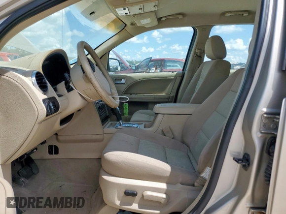 2005 Ford Freestyle SE с VIN 1FMZK04155GA04012, выставлен на аукционе Copart как лот 62201565 с пробегом 146 740 миль миль и Чистый • Clean title. История ставок и продаж доступна на DreamBid. Изображение 7.