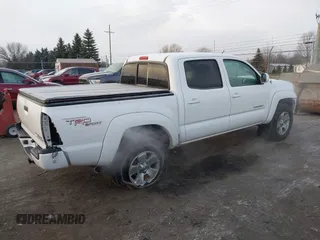 2006 Toyota Tacoma PreRunner z VIN 5TEJU62N06Z284114, wystawiony jako IAAI lot #41285658 z przebiegiem 92 160 mil mil oraz . Historia ofert i sprzedaży dostępna na DreamBid. Obrazek 4.