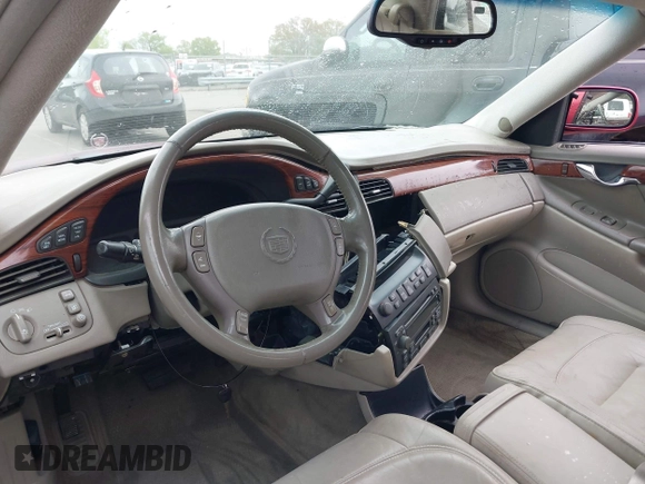 2002 Cadillac DeVille with VIN 1G6KD57YX2U257123, listed as a IAAI auction lot 41952025 with 180,278 mi miles. Bid and sale history available at carsss.com. Image 17.