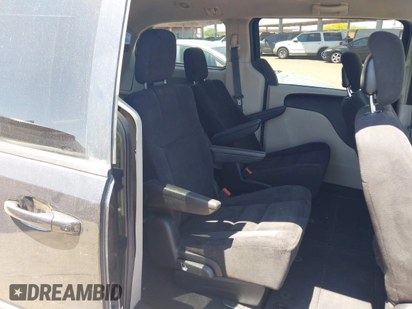 2014 Dodge Grand Caravan SXT with VIN 2C4RDGCG7ER265931, listed as a IAAI auction lot 42141644 with 205,968 mi miles and . Bid and sale history available at DreamBid. Image 8.