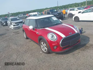 2018 MINI Hardtop 4 Door Cooper z VIN WMWXU1C50J2F79254, wystawiony jako IAAI lot #42396305 z przebiegiem 83 510 mil mil oraz . Historia ofert i sprzedaży dostępna na DreamBid. Obrazek 1.