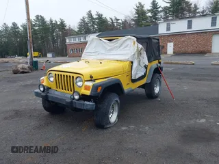 2000 Jeep Wrangler Sport with VIN 1J4FA49S9YP736984, listed as a IAAI auction lot 42055385 with 191,910 mi miles and . Bid and sale history available at DreamBid. Image 2.