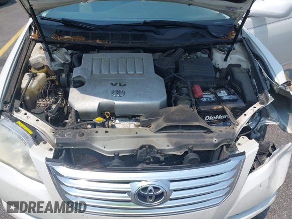 2008 Toyota Avalon XL z VIN 4T1BK36B68U304964, wystawiony jako IAAI lot #42381930 z przebiegiem 220 139 mil mil oraz . Historia ofert i sprzedaży dostępna na DreamBid. Obrazek 10.