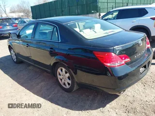 2005 Toyota Avalon XL with VIN 4T1BK36B95U048332, listed as a IAAI auction lot 41977547 with 61,293 mi miles and . Bid and sale history available at carsss.com. Image 3.