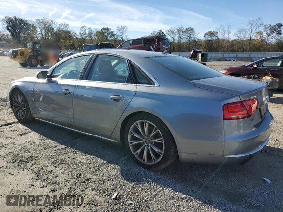 2013 Audi A8 3.0L with VIN WAUAGAFD6DN012546, listed as a Copart auction lot 82210024 with 121,004 mi miles and Clean title. Bid and sale history available at DreamBid. Image 2.