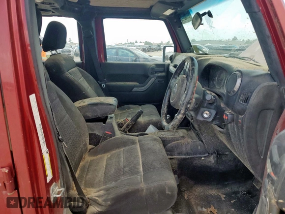 2012 Jeep Wrangler Unlimited Sport RHD with VIN 1C4BJWKG3CL230718, listed as a Copart auction lot 61789775 with Not provided miles and Clean title. Bid and sale history available at DreamBid. Image 7.
