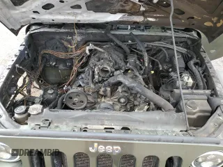 2007 Jeep Wrangler Unlimited X z VIN 1J4GA39197L181305, wystawiony jako Copart lot #45928555 z przebiegiem Nie podano mil oraz Szkoda całkowita • Salvage title. Historia ofert i sprzedaży dostępna na DreamBid. Obrazek 11.