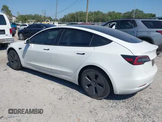2022 Tesla Model 3 Long Range with VIN 5YJ3E1EB1NF116850, listed as a IAAI auction lot 42062677 with 48,744 mi miles and . Bid and sale history available at DreamBid. Image 3.