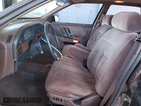 1988 Ford Taurus LX with VIN 1FABP5345JG210480, listed as a Copart auction lot 50248585 with 47,172 mi miles and Salvage Title. Bid and sale history available at carsss.com. Image 7.