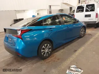 2022 Toyota Prius LE with VIN JTDL9MFU8N3032821, listed as a IAAI auction lot 40502056 with 70,009 mi miles. Bid and sale history available at carsss.com. Image 4.