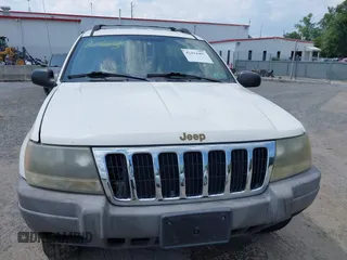 2003 Jeep Grand Cherokee Laredo with VIN 1J4GW48S73C605561, listed as a IAAI auction lot 42424407 with Not provided miles and . Bid and sale history available at DreamBid. Image 10.