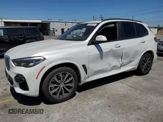 2019 BMW X5 xDrive40i with VIN 5UXCR6C59KLK82488, listed as a Copart auction lot 63330925 with 106,924 mi miles and Salvage title. Bid and sale history available at DreamBid. Image 1.